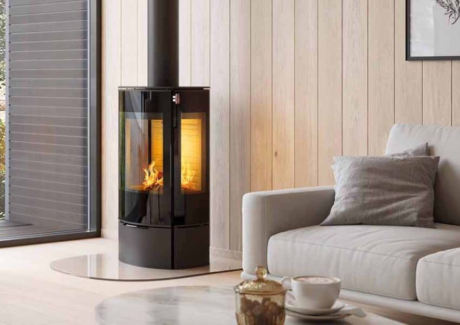 Appelman-Haarden-Architectuur-Sfeerfoto Strakke woonkamer met grijzige tinten en een gietijzeren kachel van Fireplace Haarden